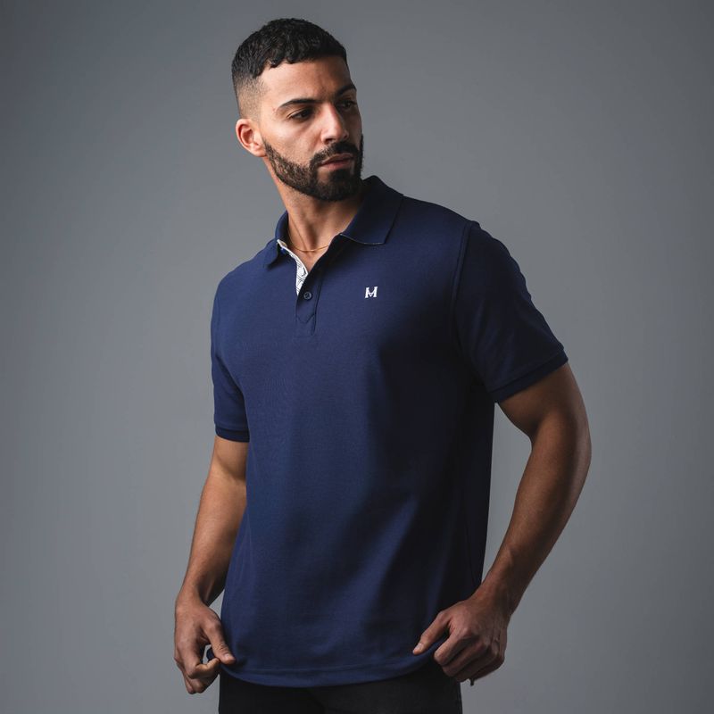 camiseta-polo-insignia-azul-tierra-arriba_6