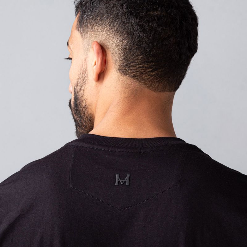 camiseta-elemental-logotipo-negro-tierra-arriba_5